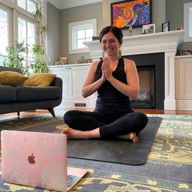 Lauren Gennett Lewis leads a Vinyasa yoga class through Zoom, in her home in Boulder, in March 2020. She will continue to offer the donation-based classes every Wednesday and Sunday at noon. All proceeds will go to help a friend of hers who is battling cancer.  (Phil Lewis/ Courtesy photo)